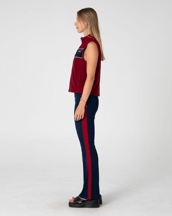woman-wearing-bless-up-polar-fleece-vest-in-cranberry-navy-blue