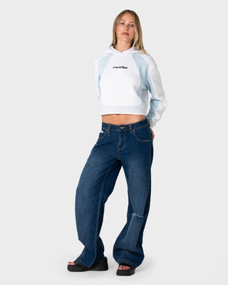 Woman wearing Mini Two Tides Cropped Hooded Fleece in Ecru Marle