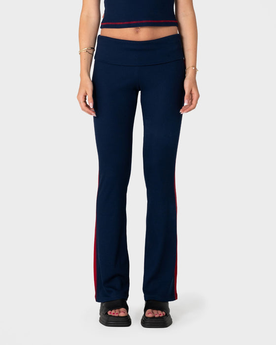 woman-wearing-hilton-low-rise-bootleg-rib-pant-in-navy-blue