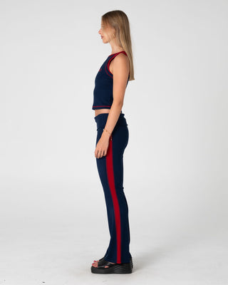Woman wearing Hilton Low Rise Bootleg Rib Pant in Navy Blue