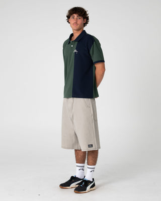 Man wearing Pop Top Short Sleeve Polo in Green Gables