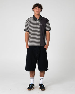 Man wearing Pop Top Short Sleeve Polo in Stone Grey