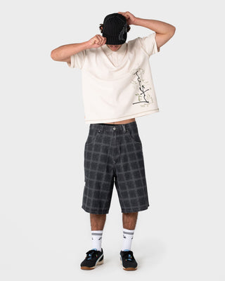 Man wearing Funkshen Short Sleeve Polo in Cream