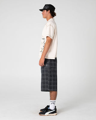 Man wearing Funkshen Short Sleeve Polo in Cream