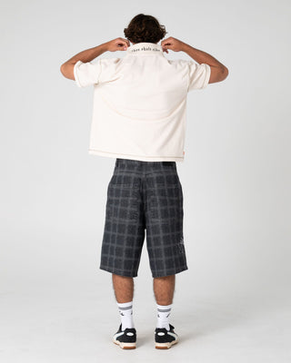 Man wearing Funkshen Short Sleeve Polo in Cream