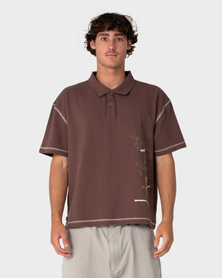 Man wearing Funkshen Short Sleeve Polo in Pinecone