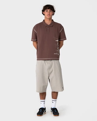 Man wearing Funkshen Short Sleeve Polo in Pinecone
