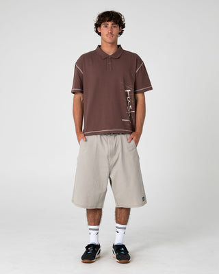 Man wearing Funkshen Short Sleeve Polo in Pinecone