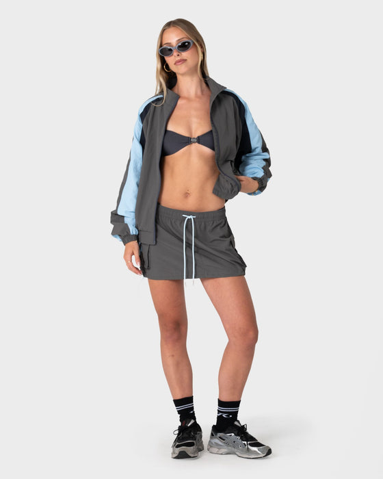 woman-wearing-new-age-low-rise-mini-skirt-in-grey-blue