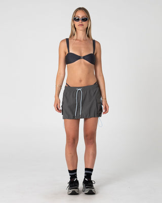 Woman wearing New Age Low Rise Mini Skirt in Grey / Blue