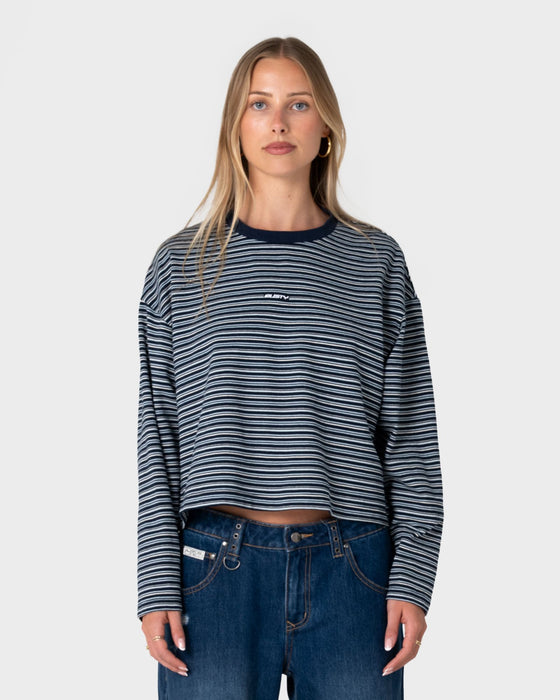 woman-wearing-17-degrees-stripe-l-s-oversize-tee-in-blue-stripe