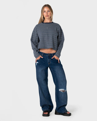 Woman wearing 17 Degrees Stripe L/S Oversize Tee in Blue Stripe