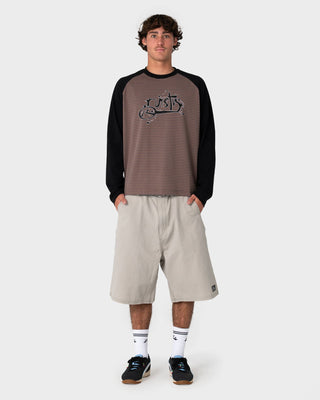 Man wearing Sip The Sizzurp Long Sleeve Tee in Pinecone