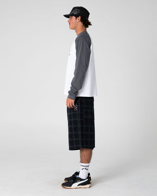 Man wearing Sip The Sizzurp Long Sleeve Tee in White