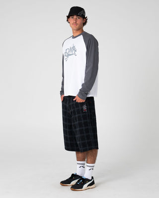 Man wearing Sip The Sizzurp Long Sleeve Tee in White