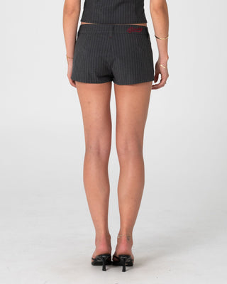 Woman wearing Finance Mummy Low Rise Suit Short in Grey Pin Stripe