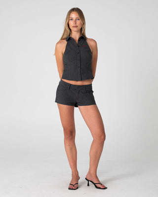 Woman wearing Finance Mummy Low Rise Suit Short in Grey Pin Stripe