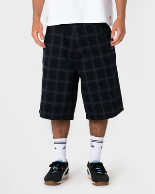 Man wearing Griddy Wide Baggy Jort in Black Out