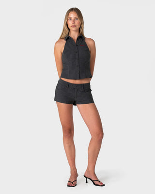 Woman wearing Missy May Sleeveless Shirt in Grey Pin Stripe