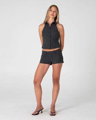 Woman wearing Missy May Sleeveless Shirt in Grey Pin Stripe
