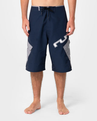 Man wearing Akimbo Fixed Waist Boardshort in Navy Blue