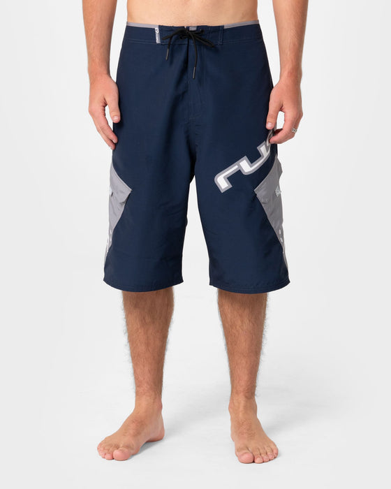 man-wearing-akimbo-fixed-waist-boardshort-in-navy-blue