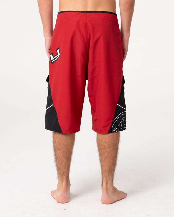 man-wearing-akimbo-fixed-waist-boardshort-in-vintage-red