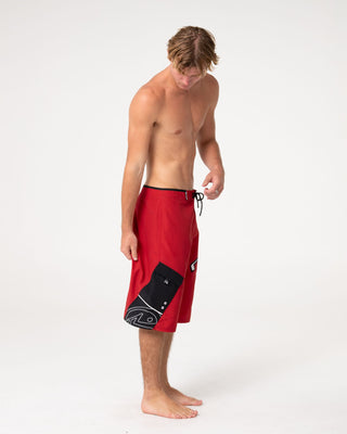 Man wearing Akimbo Fixed Waist Boardshort in Vintage Red