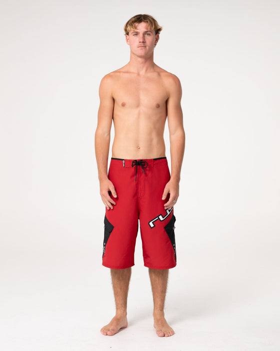 man-wearing-akimbo-fixed-waist-boardshort-in-vintage-red