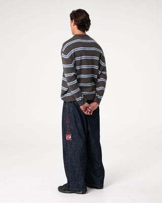 Man wearing Mista Slub Elastic Denim Jean in Raw Dawg Blue