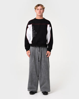 Man wearing Mista Slub Elastic Denim Jean in Washed Black