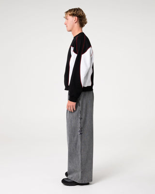Man wearing Mista Slub Elastic Denim Jean in Washed Black
