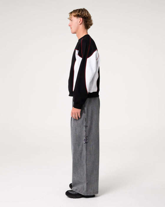 man-wearing-mista-slub-elastic-denim-jean-in-washed-black