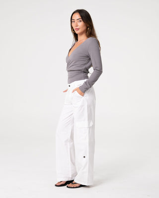 Woman wearing Honey Slouch L/S Top in Light Grey