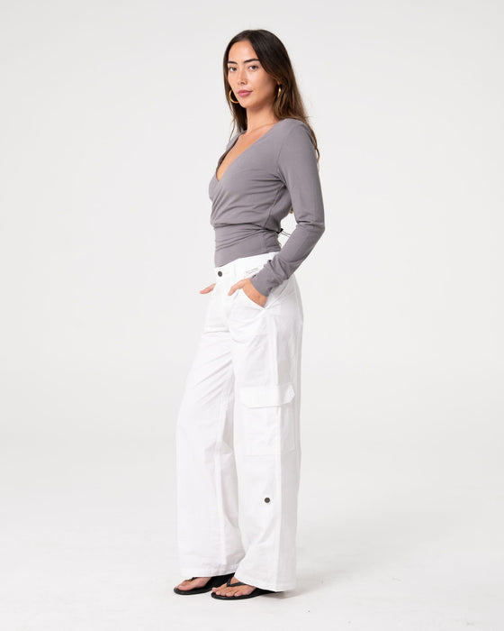 woman-wearing-honey-slouch-l-s-top-in-light-grey