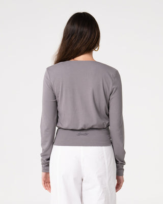 Woman wearing Honey Slouch L/S Top in Light Grey