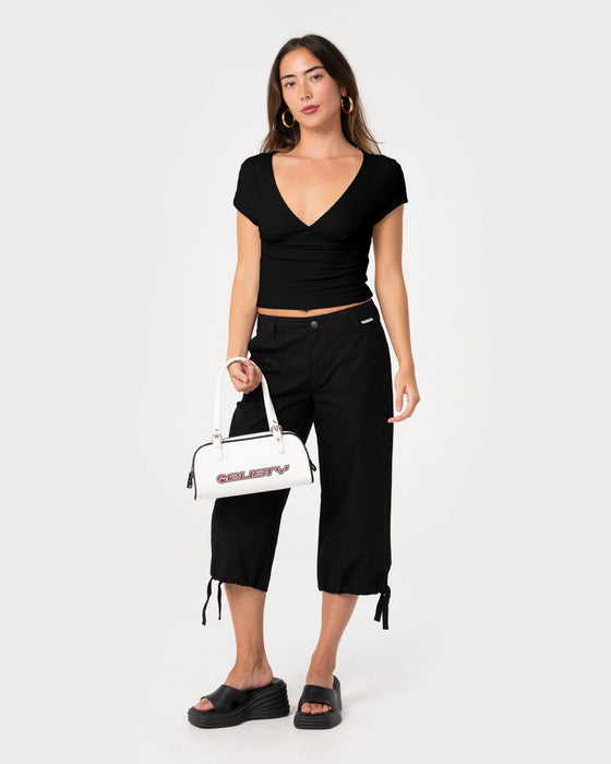 woman-wearing-christina-jersey-top-in-black