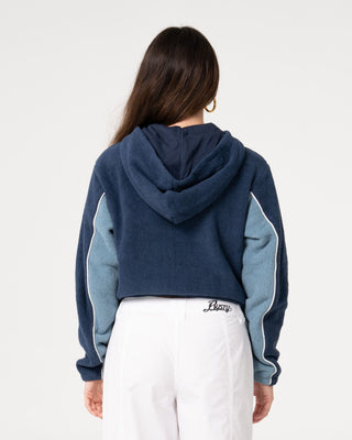 Woman wearing Mini Two Tides Zip Through Polar Fleece in Atlantic Blue