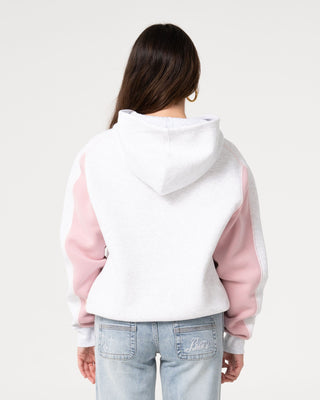 Woman wearing Cyberwaves Oversized Hood in Ecru Marle / Pink