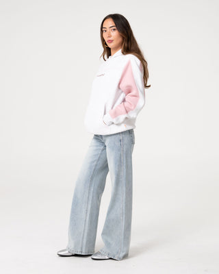 Woman wearing Cyberwaves Oversized Hood in Ecru Marle / Pink