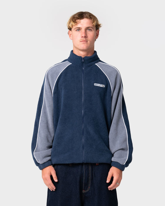 man-wearing-pimp-my-tides-zip-thru-sherpa-fleece-in-navy-blue