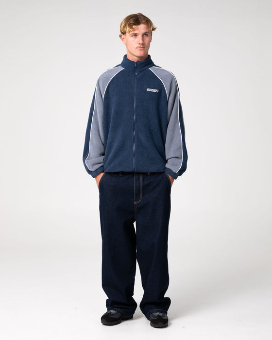 man-wearing-pimp-my-tides-zip-thru-sherpa-fleece-in-navy-blue
