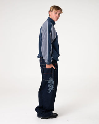 Man wearing Pimp My Tides Zip Thru Sherpa Fleece in Navy Blue