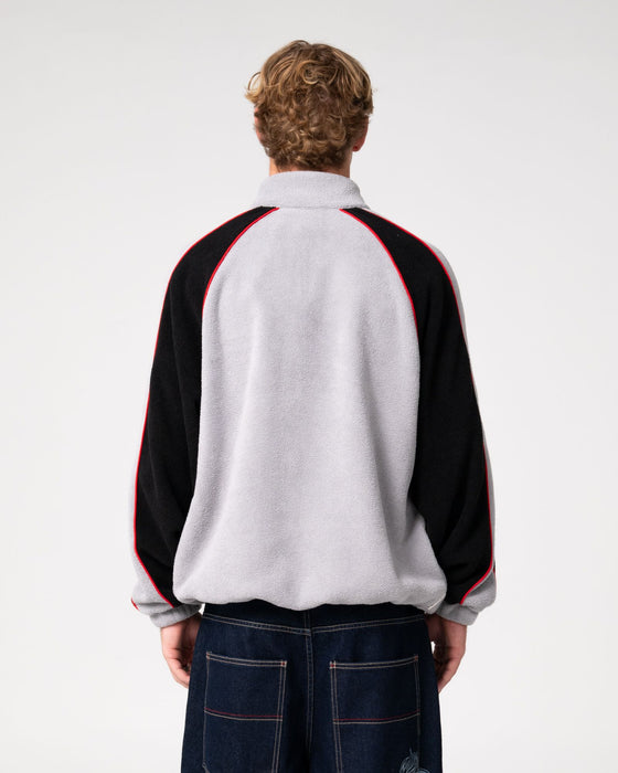 man-wearing-pimp-my-tides-zip-thru-sherpa-fleece-in-stone-grey
