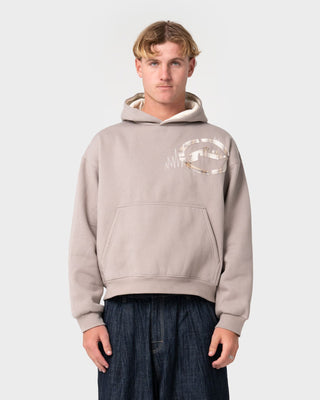 Man wearing Uncut Gems Hooded Fleece in Stone