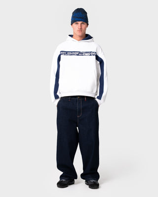 Man wearing Big Ticket Hooded Fleece in Ecru Marle