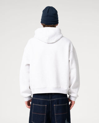 Man wearing Big Ticket Hooded Fleece in Ecru Marle