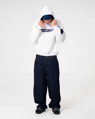 Man wearing Big Ticket Hooded Fleece in Ecru Marle