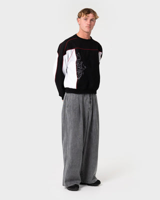 Man wearing Sawblaze Crew Neck Fleece in Black