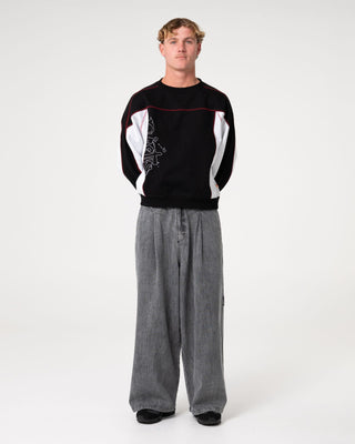 Man wearing Sawblaze Crew Neck Fleece in Black